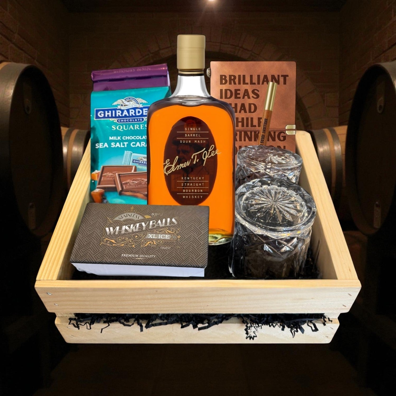 Elmer T. Lee Single Barrel Bourbon Gift Crate with bottle, crystal glasses, journal and chocolates displayed in wooden crate inside a bourbon cellar – exclusive collector’s gift from Total Bourbon