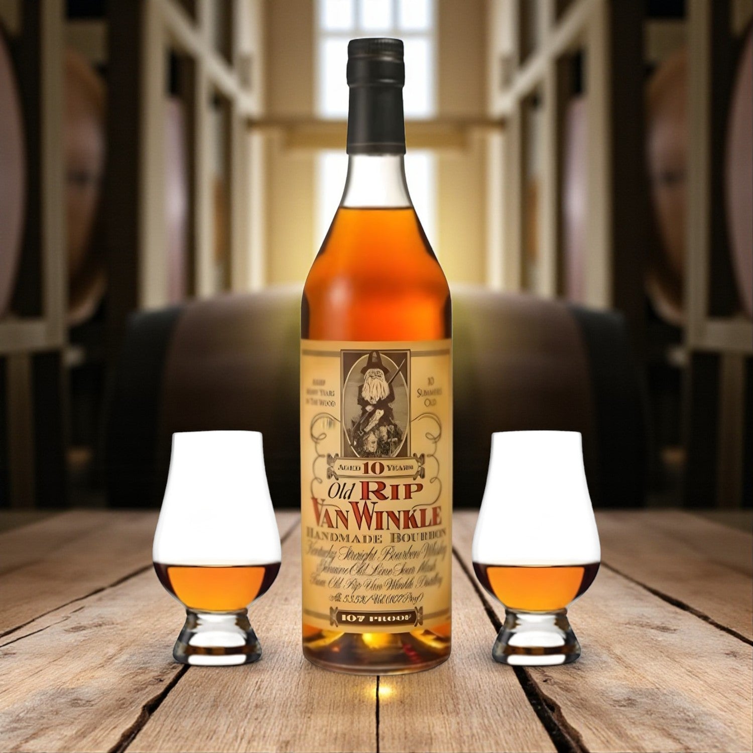Old Rip Van Winkle 10 Year Bourbon Gift Set with two Glencairn glasses on wooden table surrounded by bourbon barrels – lifestyle shot from Total Bourbon