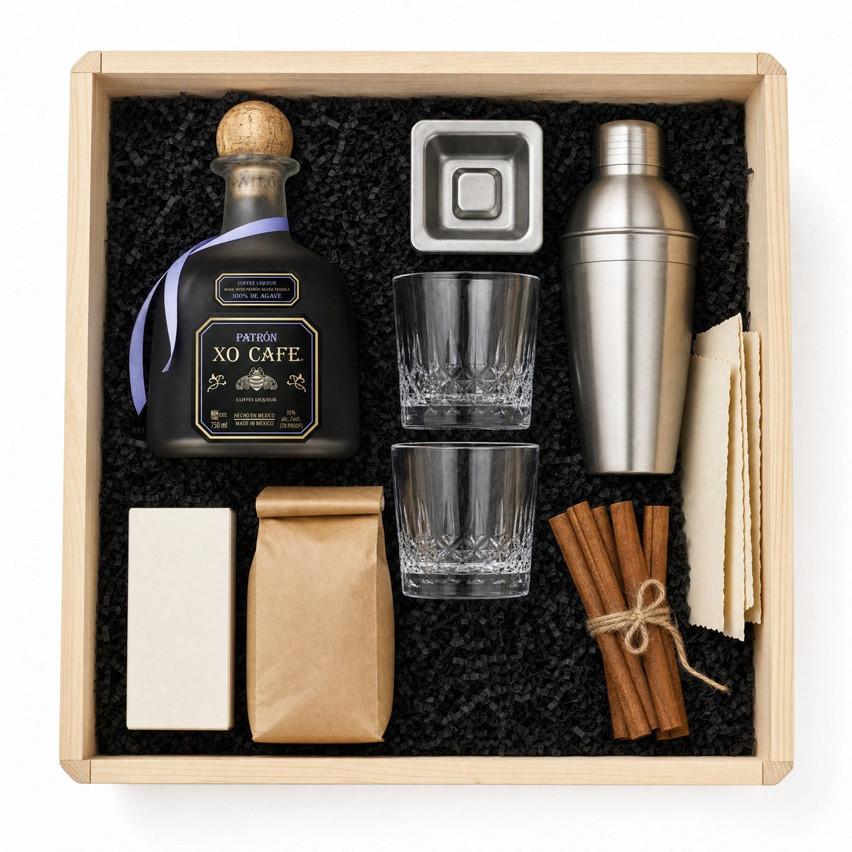 XO Cafe Iced Trio Crate - packed pine crate with black crinkle fill: bottle, glasses, cold brew, mix, ice mold, shaker, cinnamon, recipe cards