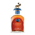 A bottle of Caribou Crossing Single Barrel Canadian Whiskey with a distinctive gold moose cap on the top.