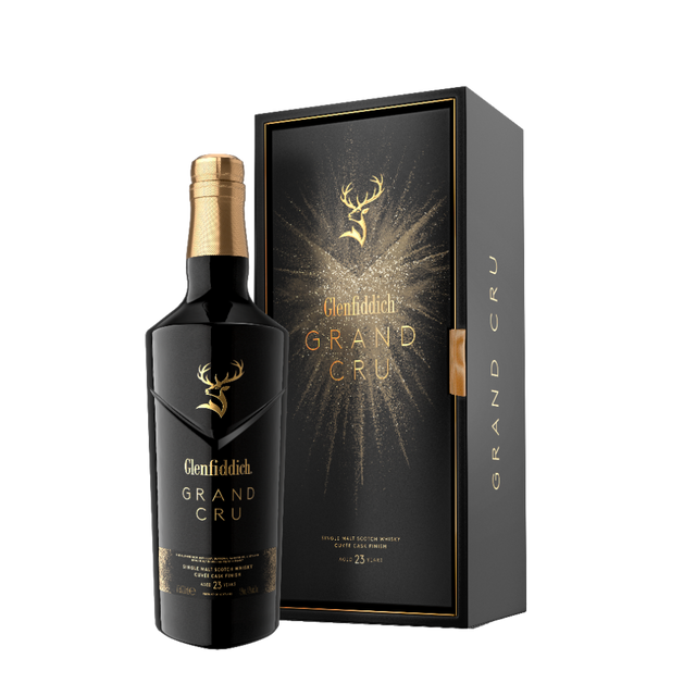 Glenfiddich Grand Cru 23 Year Old Scotch whisky bottle with gift box on black background