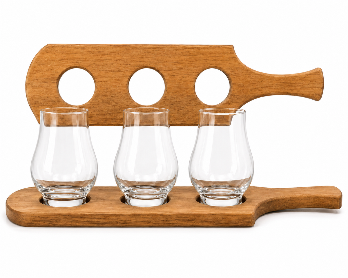 Wooden tasting paddle with three clear glasses on a white background