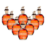 Blanton's Gold Edition Single Barrel Bourbon complete 8-bottle collector's set with gold horse and jockey stoppers and rose gold neck bands, 750ml bottles