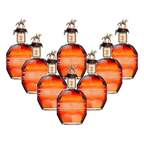 Blanton's Gold Edition Single Barrel Bourbon complete 8-bottle collector's set with gold horse and jockey stoppers and rose gold neck bands, 750ml bottles
