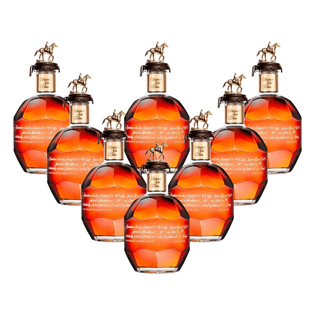 Blanton's Gold Edition Single Barrel Bourbon complete 8-bottle collector's set with gold horse and jockey stoppers and rose gold neck bands, 750ml bottles
