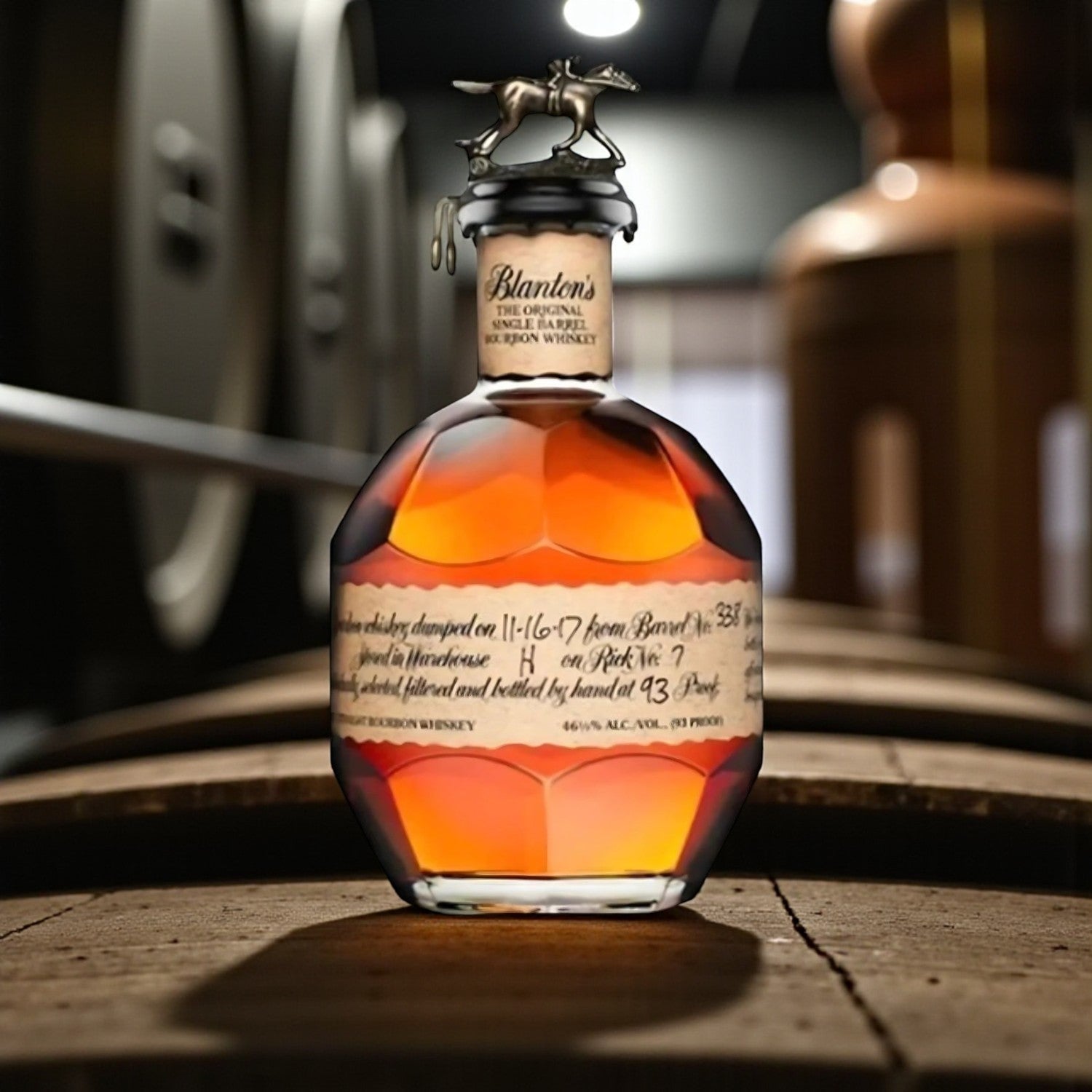 Blanton’s Original Single Barrel Bourbon 750ml on wooden barrel with glasses – lifestyle shot from Total Bourbon