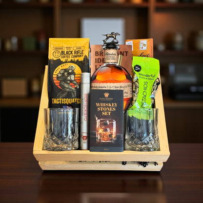 Blanton’s Original Single Barrel T Gift Crate with bourbon, coffee, chocolate, pistachios, cigar, whiskey stones, and glasses displayed on bourbon barrel – lifestyle photo from Total Bourbonp Shelf