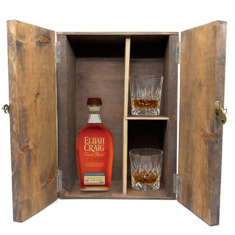 Elijah Craig Toasted Barrel in a wooden gift box with two crystal glasses on white