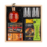 Blanton's Gold Edition bourbon gift crate with two crystal-cut glasses, whiskey stones, ground coffee, dark chocolate, and pistachios nested in a natural wood crate.