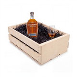 Angel's Envy Triple Oak bourbon gift crate with a Glencairn-style tasting glass and a whiskey stones set in a hand-finished wooden crate.