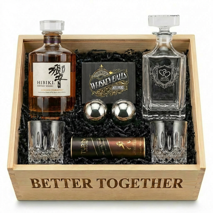 Hibiki Japanese Harmony Whisky Date Night "Better Together" Gift Crate featuring engraved decanter, two crystal-cut old-fashioned glasses, stainless-steel whiskey balls with freezer tray, and Turin liquor-filled chocolates in an engraved wooden crate