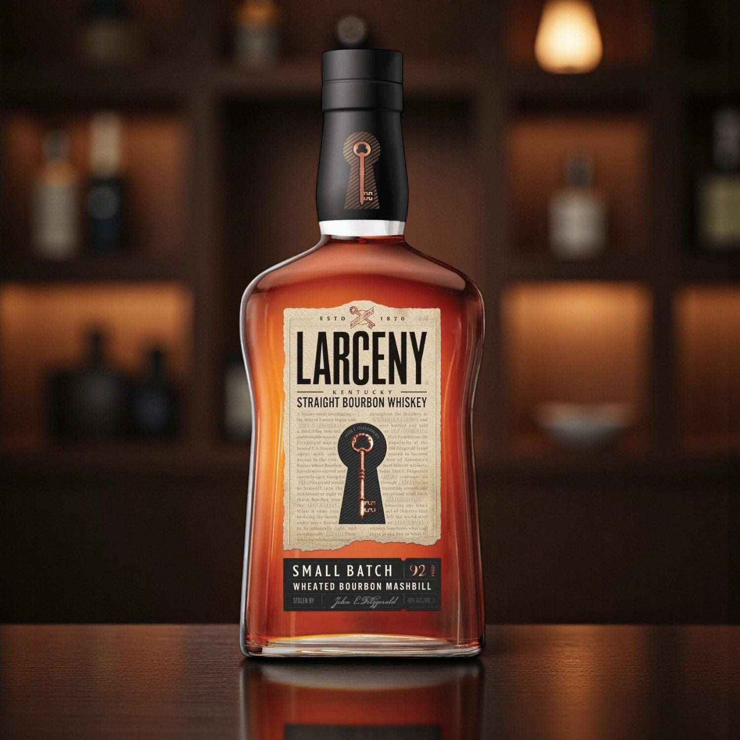 Larceny Small Batch Kentucky Straight Bourbon Whiskey bottle on bar with warm lighting – lifestyle photo from Total Bourbon