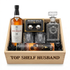 The Macallan 18 Year Double Cask Single Malt Scotch Whisky "Top Shelf Husband" Gift Crate featuring engraved decanter, two crystal-cut old-fashioned glasses, stainless-steel whiskey balls with freezer tray, and Turin liquor-filled chocolates in an engraved wooden crate