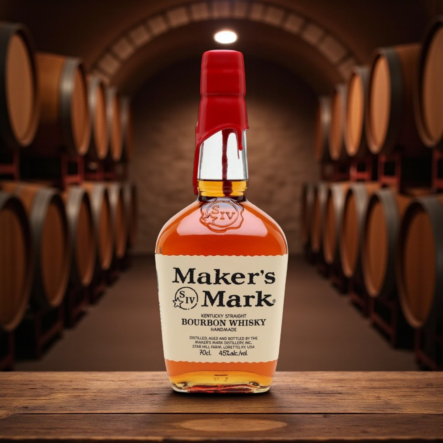 Maker’s Mark Kentucky Straight Bourbon Whisky bottle with signature red wax seal in a bourbon barrel aging room – lifestyle photo from Total Bourbon