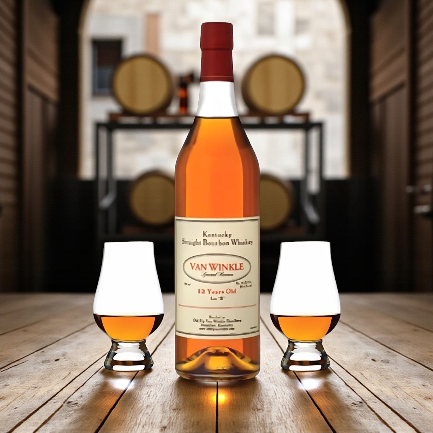 Pappy Van Winkle Special Reserve 12 Year Lot B Bourbon Gift Set with two Glencairn glasses on wooden barrel table in bourbon warehouse – lifestyle shot from Total Bourbon